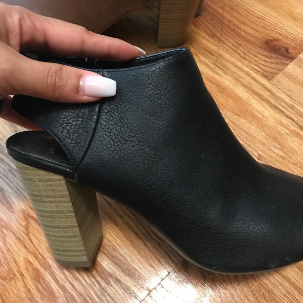 Cute black open toe and back wooden heel booties.
