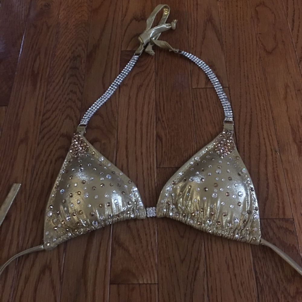 I am selling the Tan Competition Bikini. C Cup top