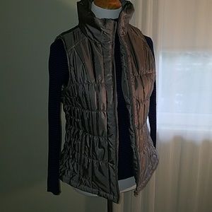 Silver puffer vest. Like new!!