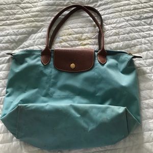 Small Longchamp bag. Light blue with tan leather
