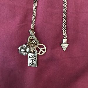 Two silver charm necklaces