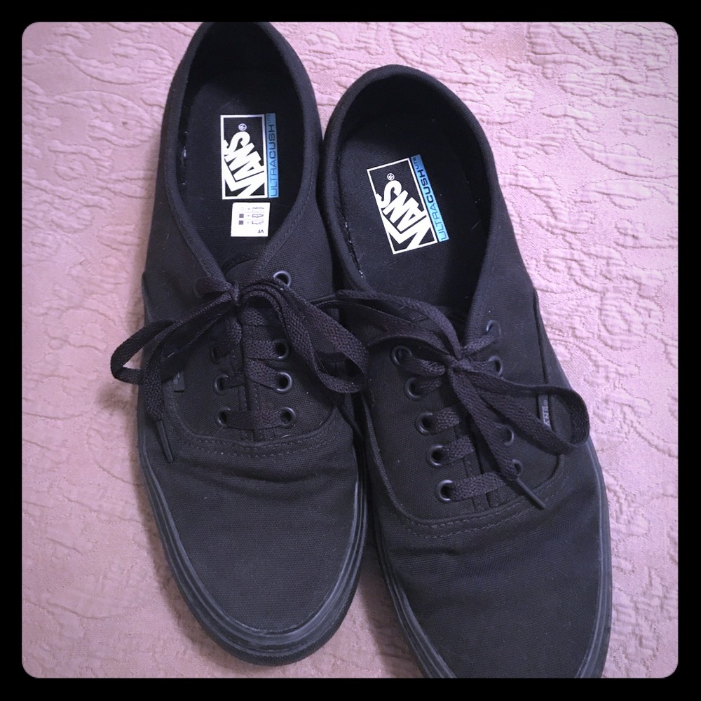 Black on black men's vans sneakers.