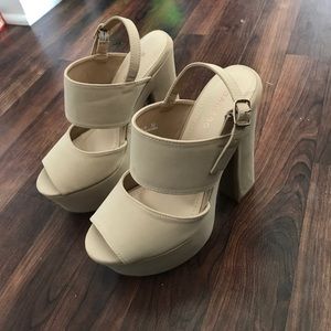 Nude platform heels