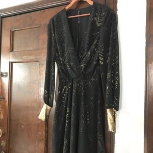 Black dress wth gold detail