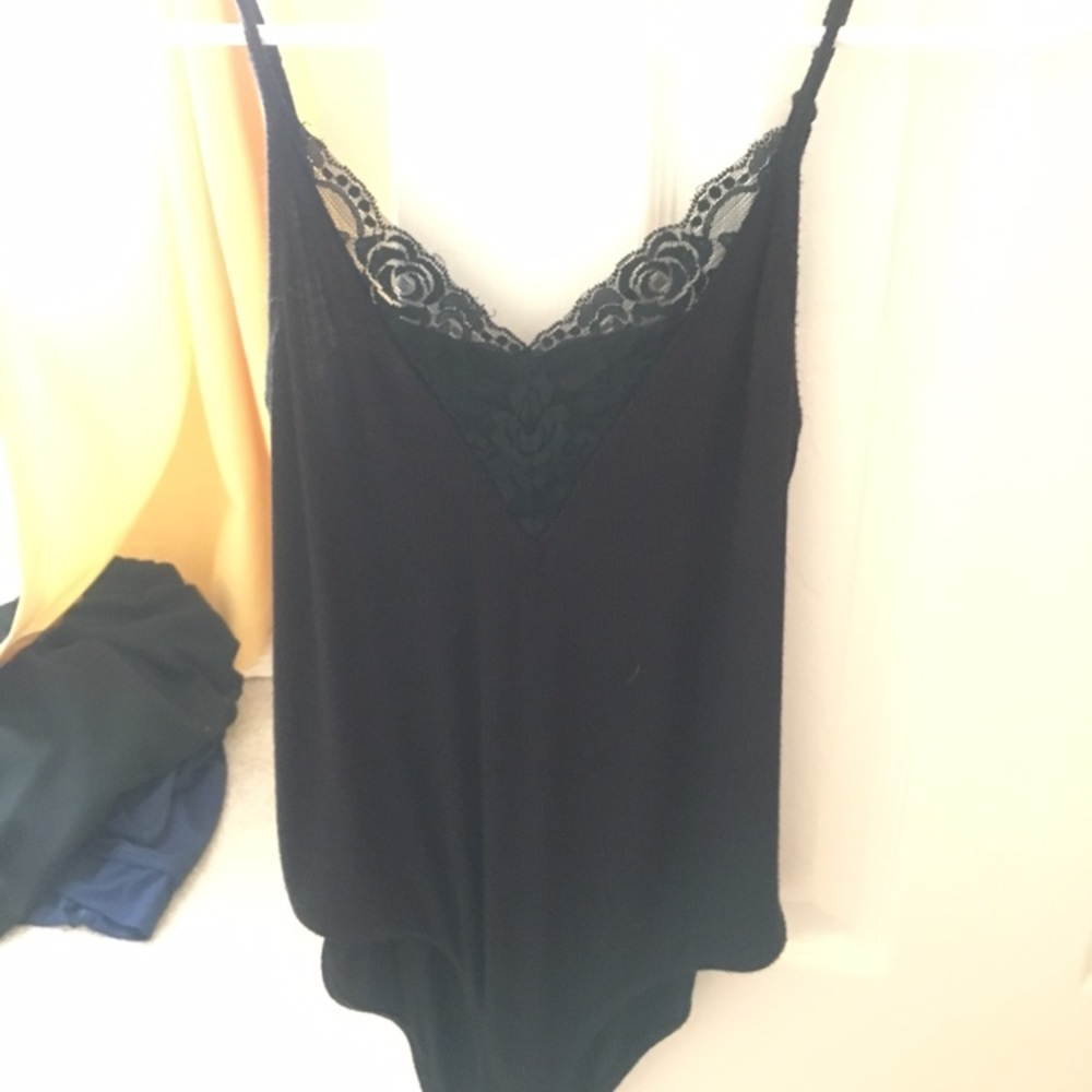 Black bodysuit with lace. Never worn!