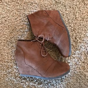 Brown wedge booties