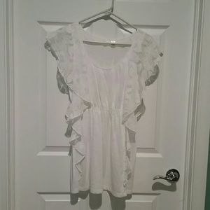 Pretty white blouse with side floral lace ruffles