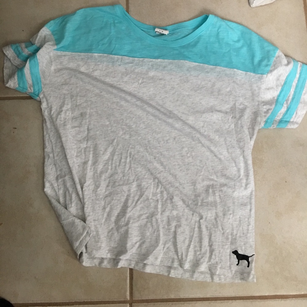 VS pink T-shirt.