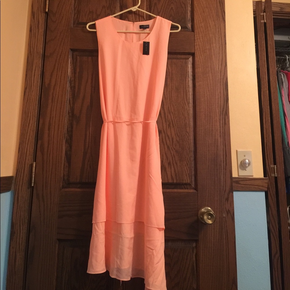 Light salmon colored hi-low dress