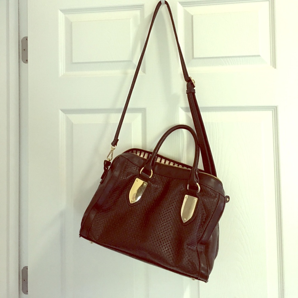 Leather purse with gold detail.