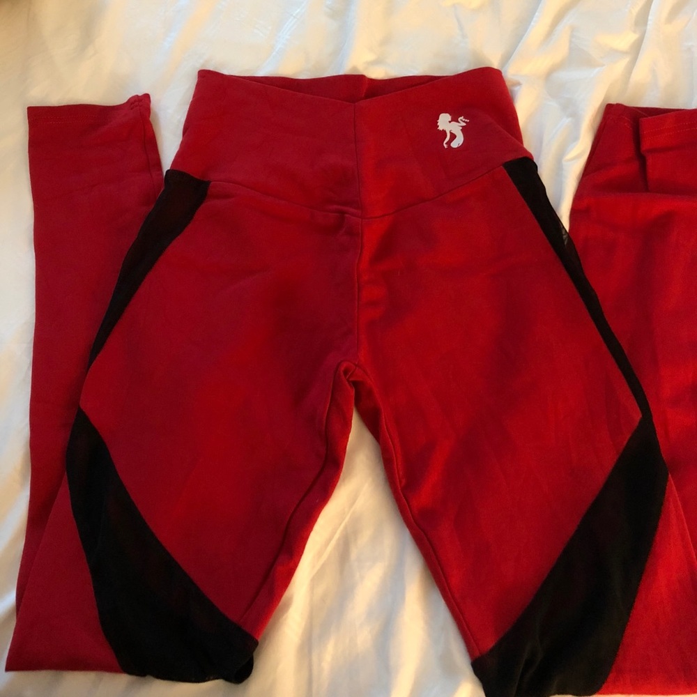 Red leggings with mesh inserts