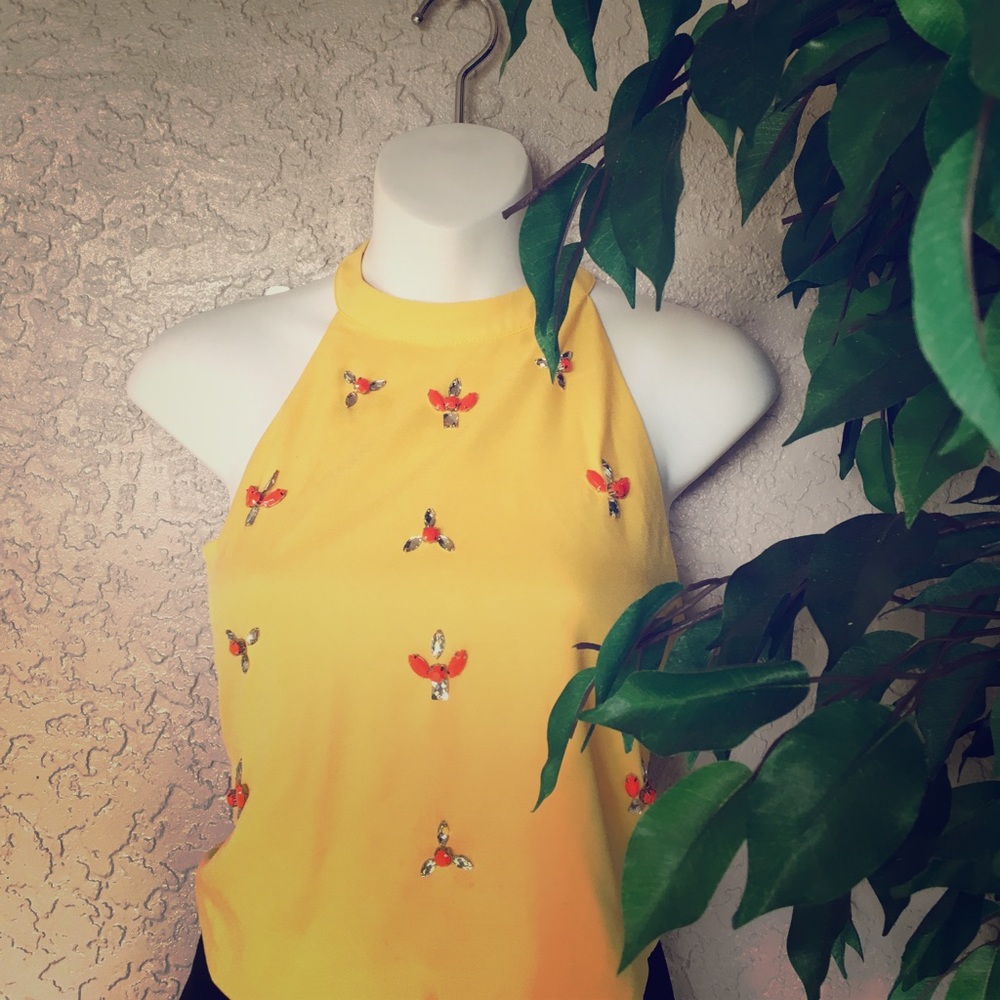 Yellow beaded crop top ties on the neck