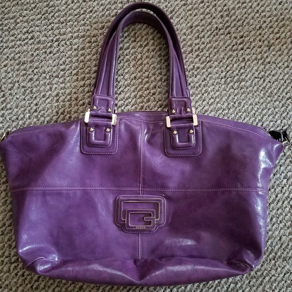 Purple guess purse