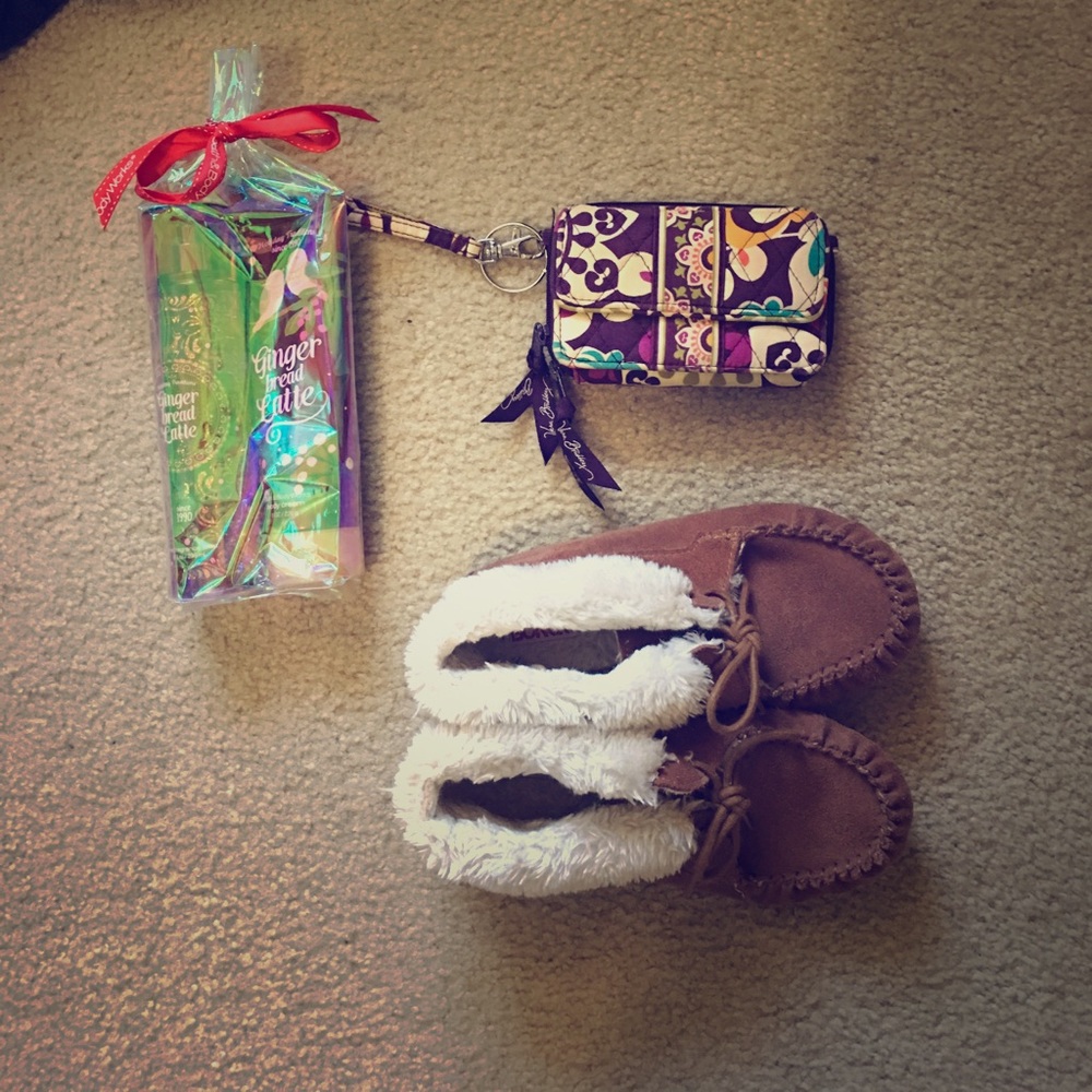 Purple Vera Bradley wristlet wallet.
