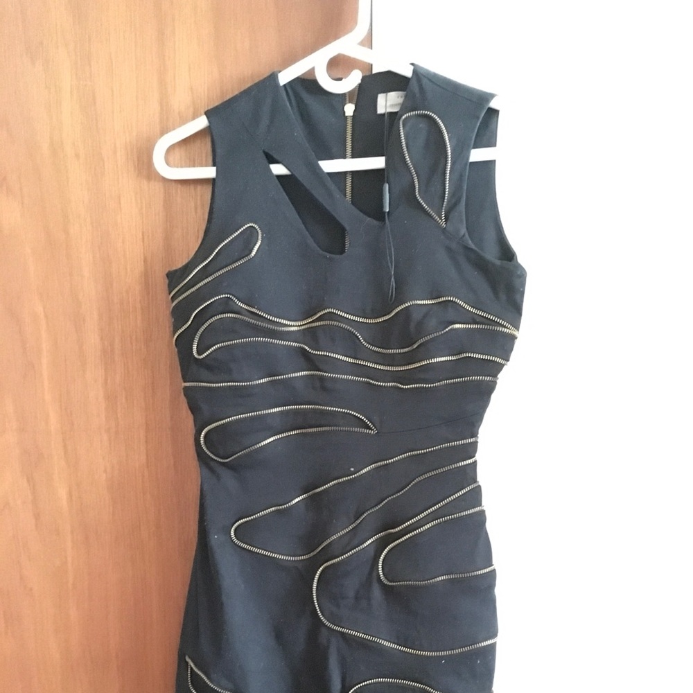 Very well made cut out zipper dress.