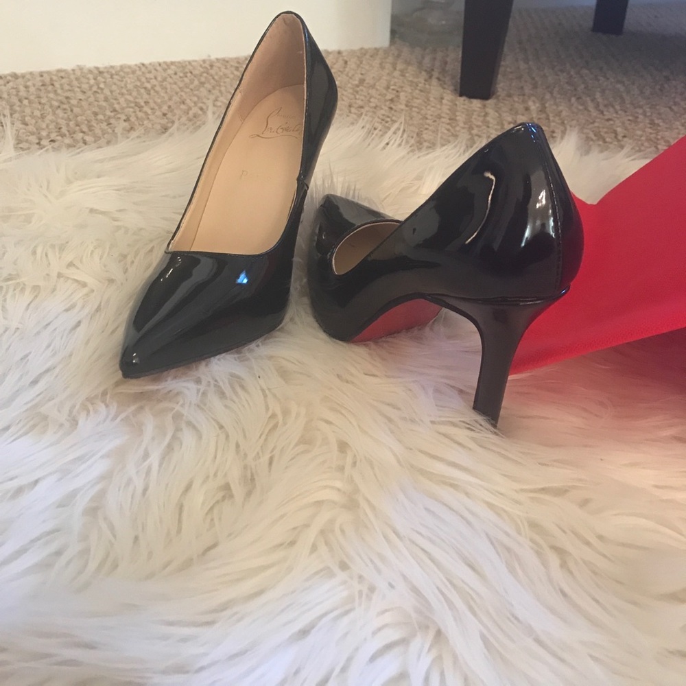 Red bottom heels, see obvious