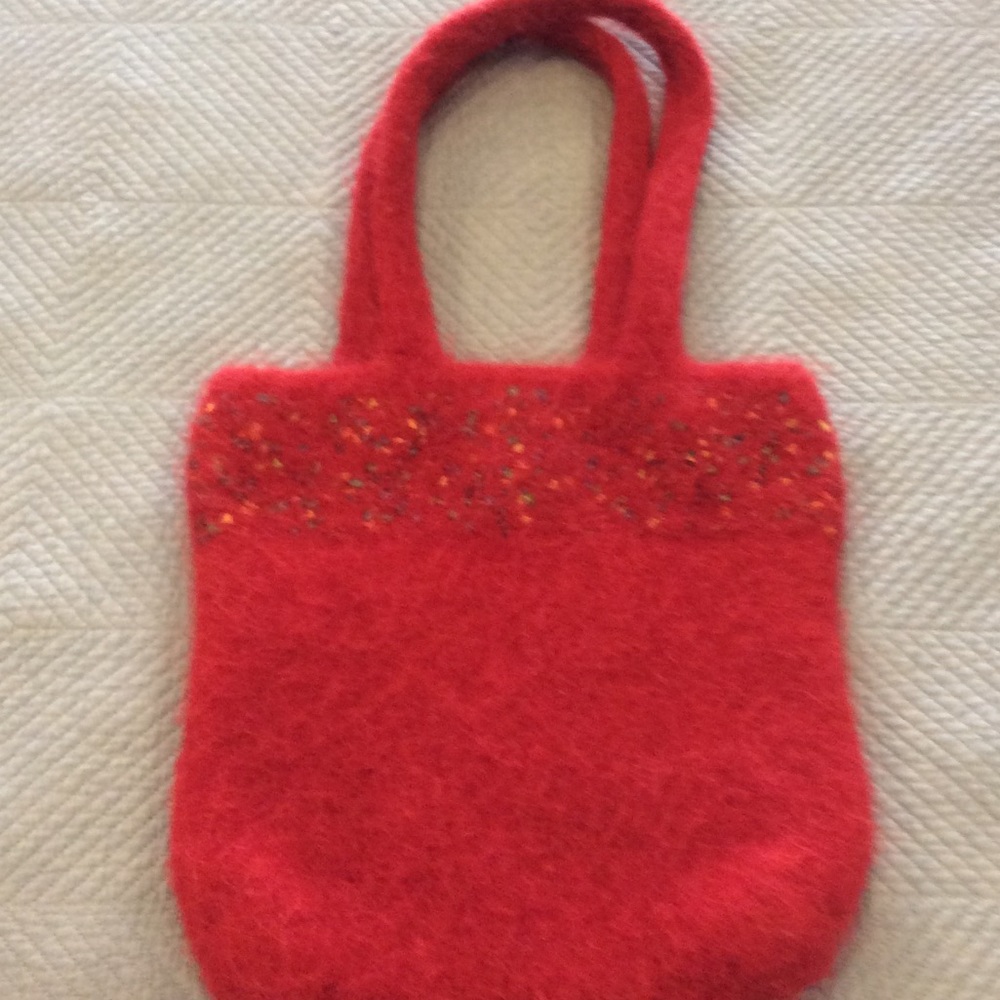 Hand knitted wool purse