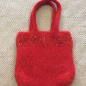 Hand knitted wool purse