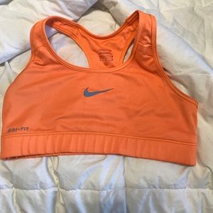 Orange Nike sports bra