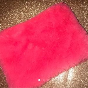 Pink fuzzy clutch
