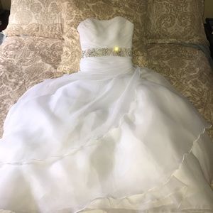 Demetria's wedding gown with veil and jacket