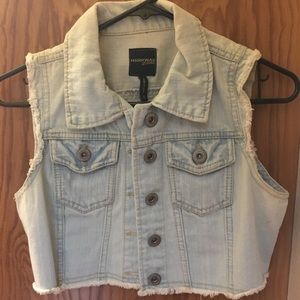 Distressed denim vest