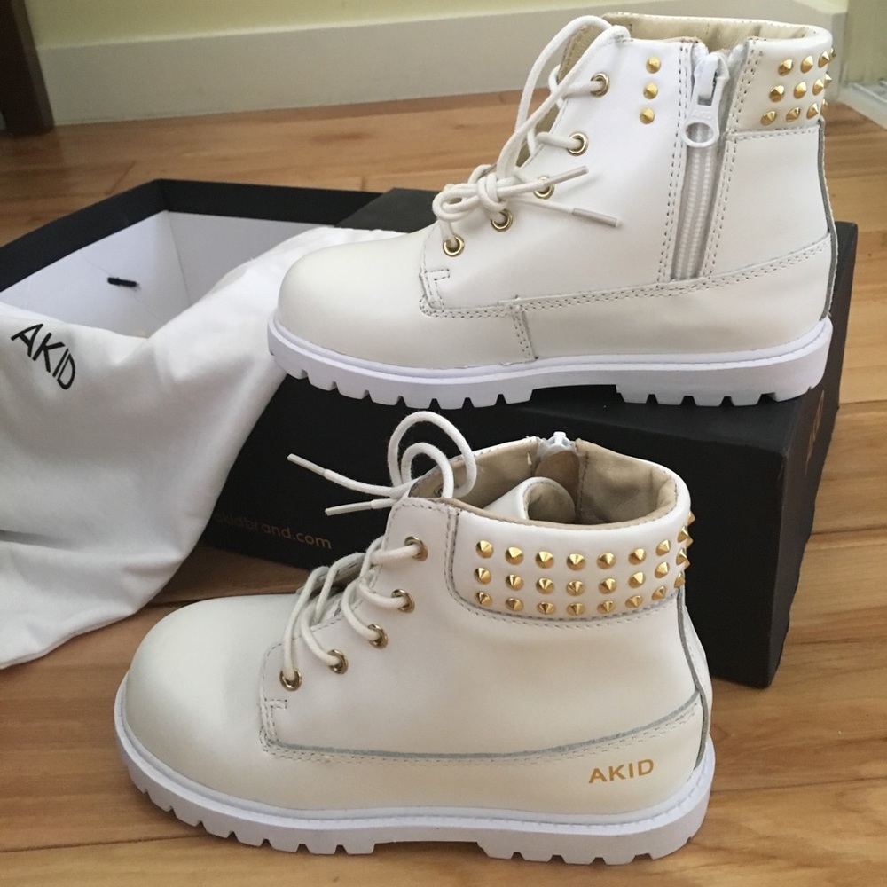 BRAND NEW. AKID studded shoes for a boy.