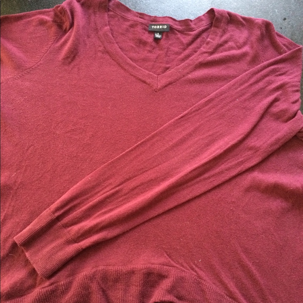 Shark bite Hem Knit Top