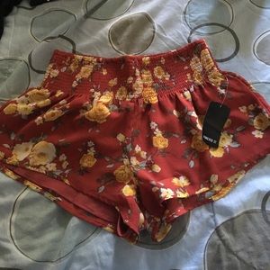 rust/mustard flowy woven shorts