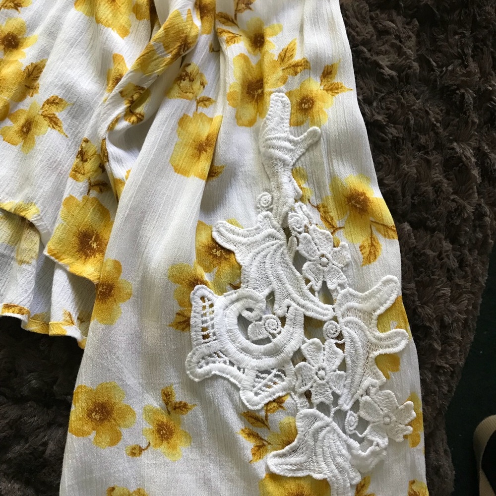 Bell sleeved top with embroidered sleeves