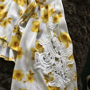 Bell sleeved top with embroidered sleeves