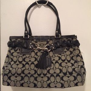 Black and whit coach signature purse