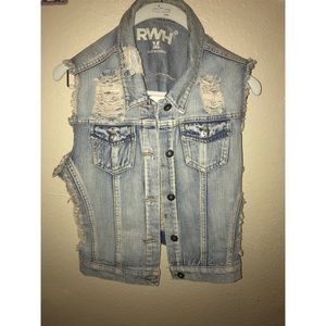 Distressed denim vest