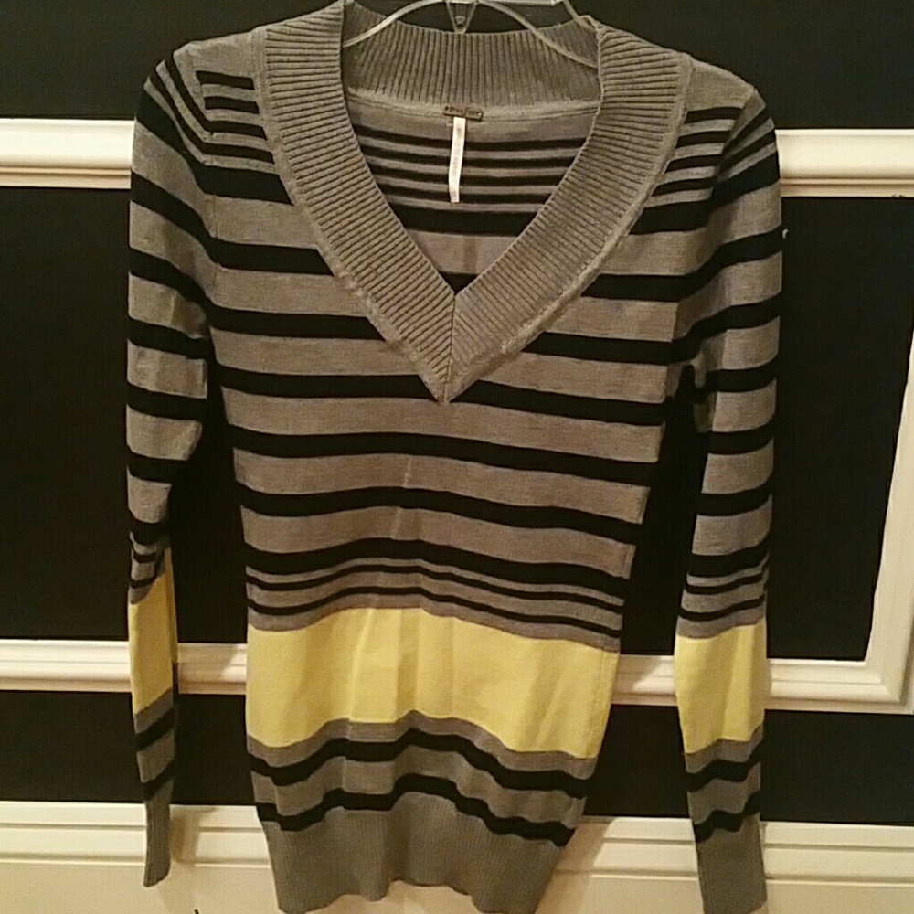 Black, gray, and yellow striped sweater