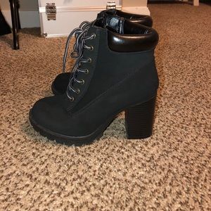 Black heeled booties with lace up