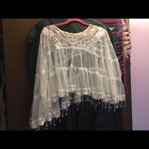 White embroidered poncho