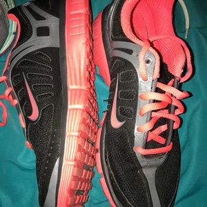 Coral & black Nikes