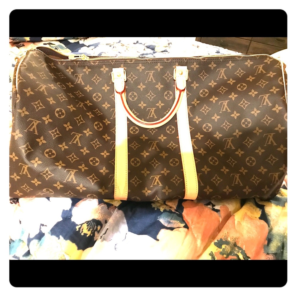 Louis Vuitton travel bag.