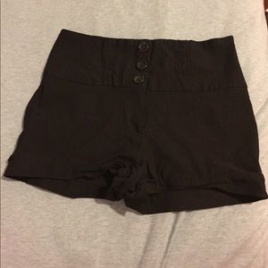 Black high-waisted shorts. Medium
