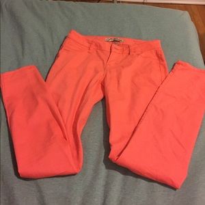 Coral colored skinny jeans