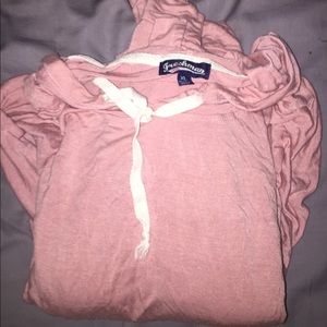 an oversized baby pink hoodie