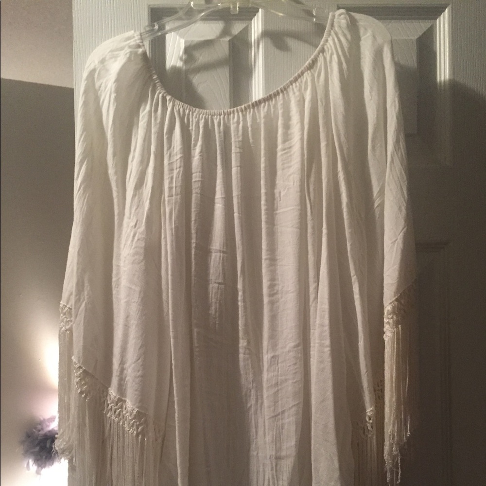 Western style top with fringe sleeves!