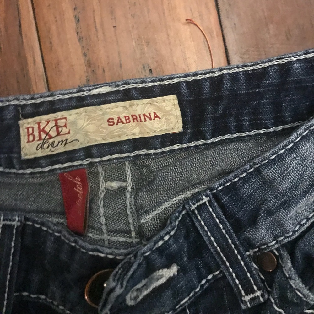 Buckle blue jeans
