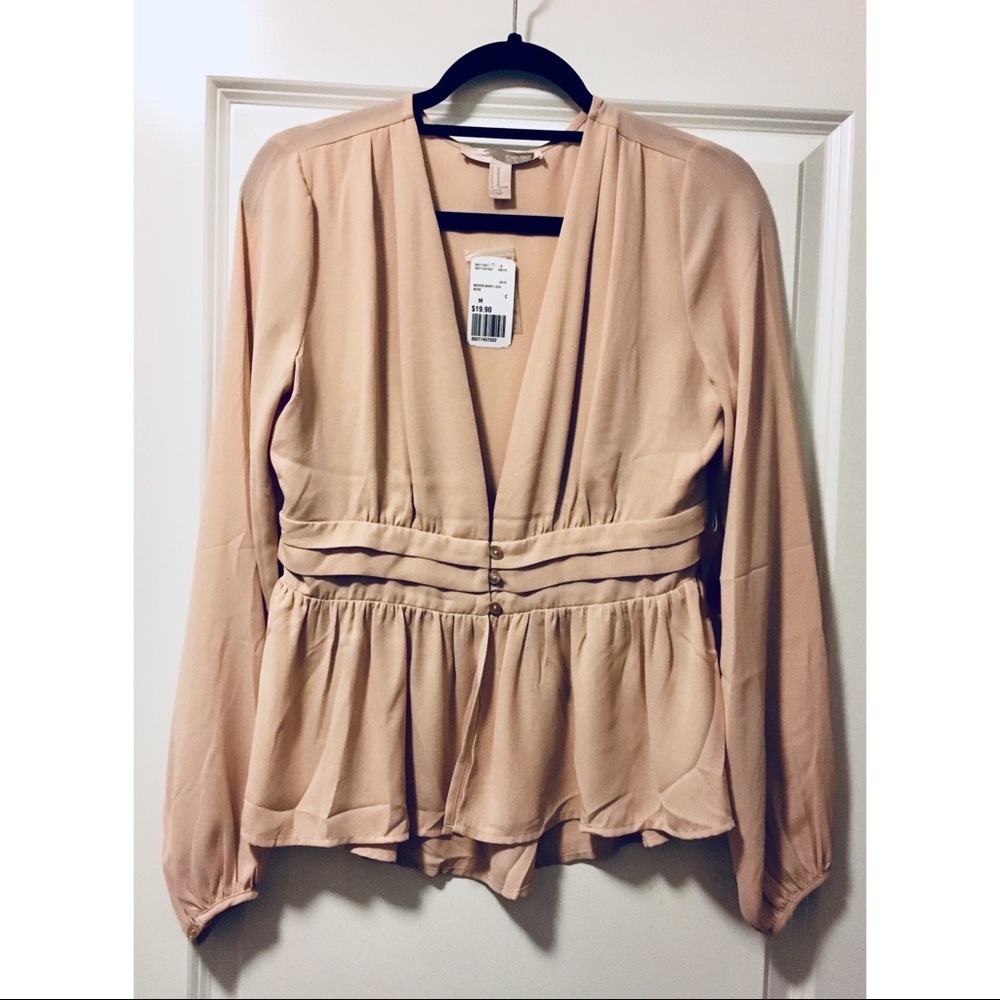 Forever21 peplum blouse top. Deep V neck.