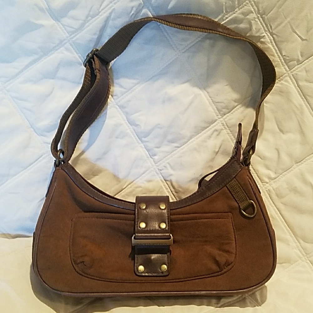 Soft brown purse with bronze hardware