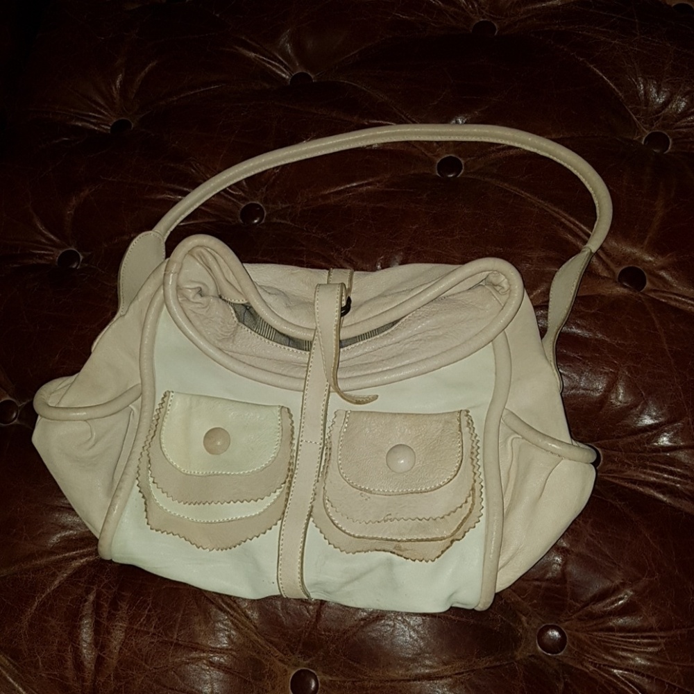 cream colored leather purse