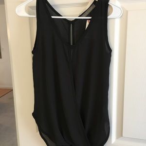 Sheer, wrap tank. Fits like a high/low top.