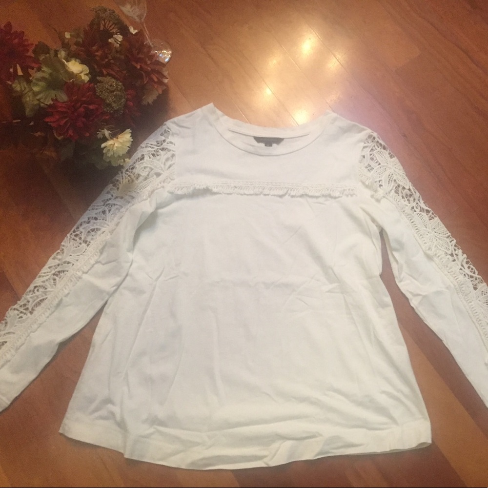 Banana Republic cotton top with lace sleeves.