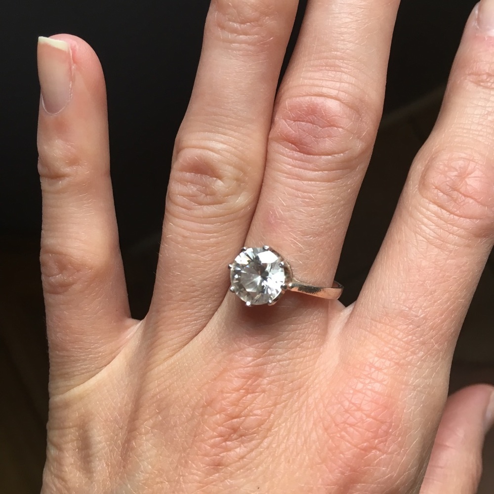 Silver ring with a round cut zirconia