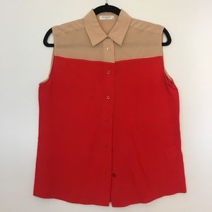 Equipment sleeveless button down